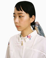 Apres Ski Figurine Necklace