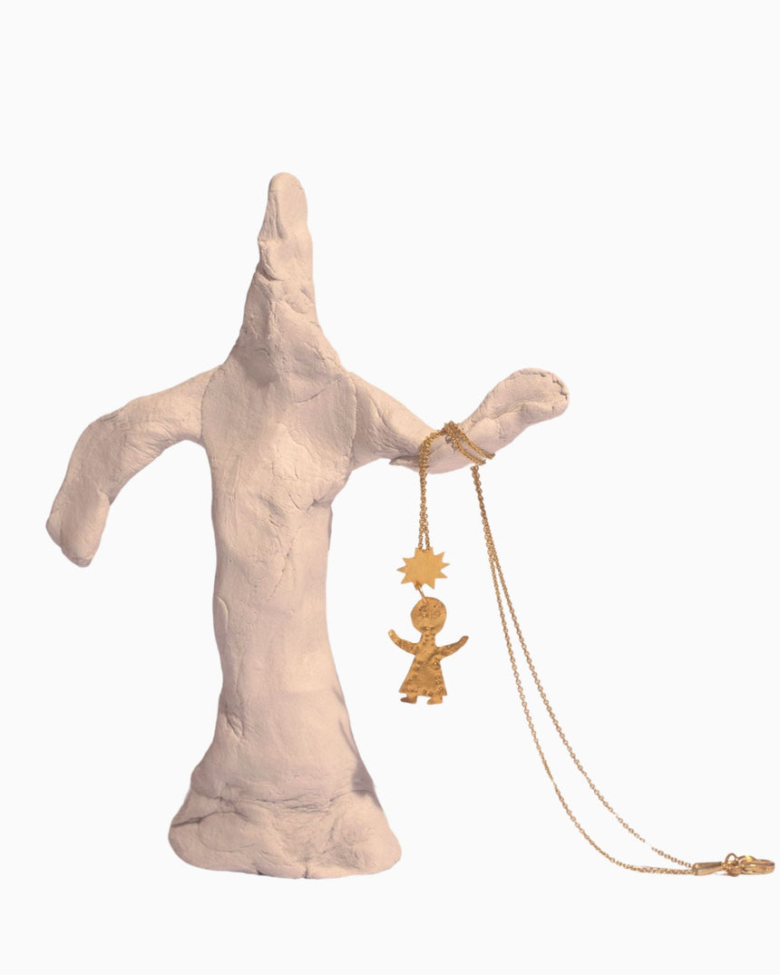 Apres Ski Figurine Necklace